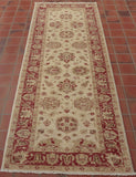 This runner will bring light and warmth to any hallway or landing.  A pinky red is used in the border and in some of the floral decoration. There is a high level of decoration in the main ground. 