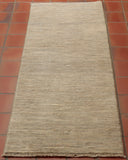 This Afghan Gabbeh runner is rather simplistic, possessing a textured mid-light grey colour throughout - perfect for those who want a handmade rug that is more modernistic.