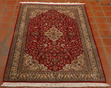 A vibrant red silk provides good opportunity to show the curvilinear flower design. Lovely shades of blue are punctuated by duck egg shades. The outer border is a soft cream.