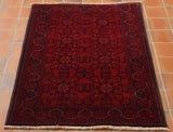 The detail in the design is very detailed due to the close knotting of the pile. This is a dark cherry red, not rust-red.